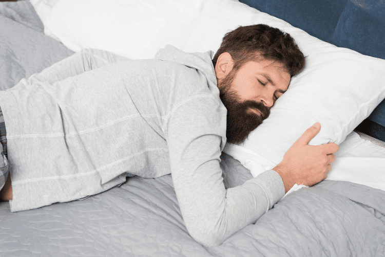 a man sleeping in bed, closeup
