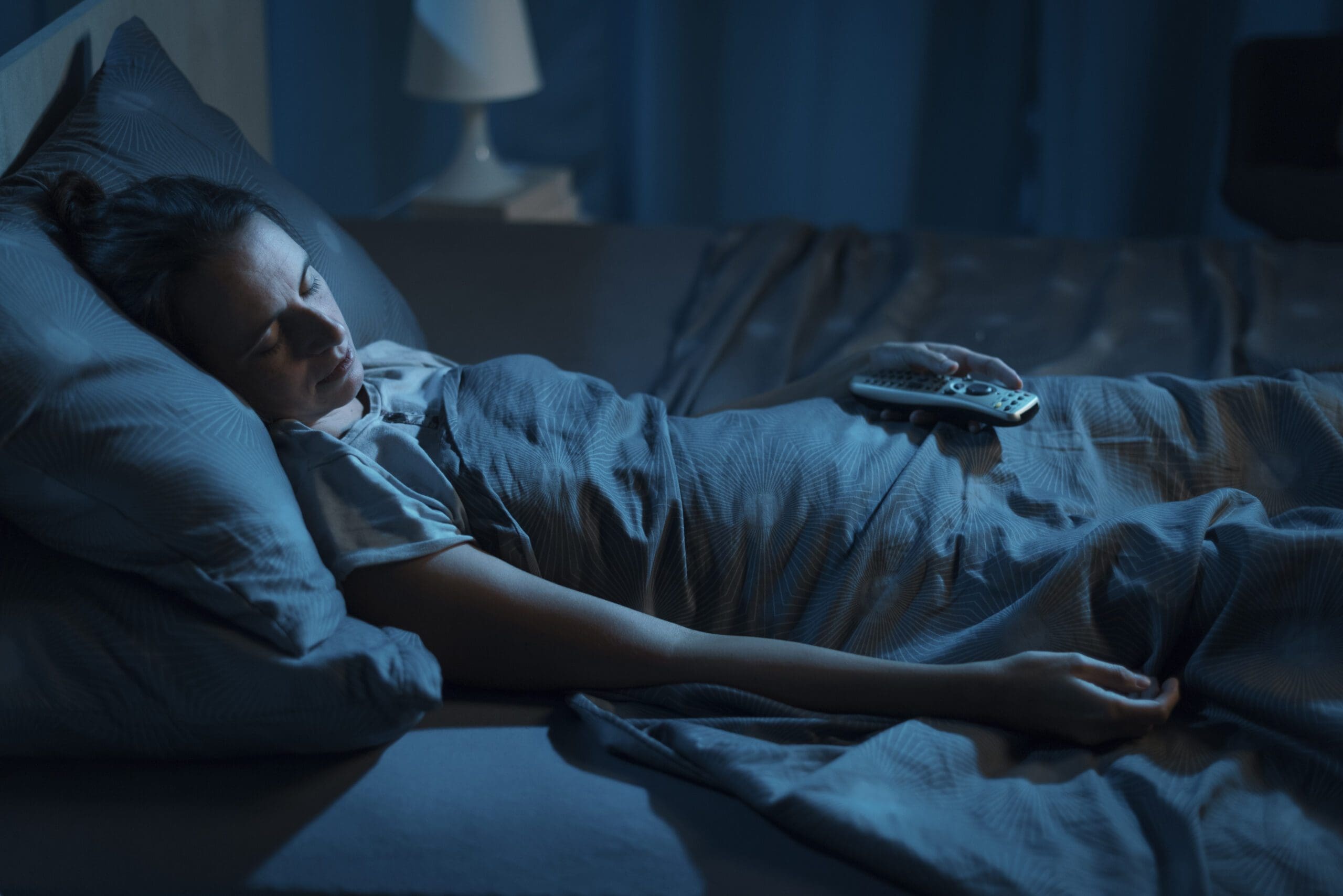 Woman can't sleep without the tv on